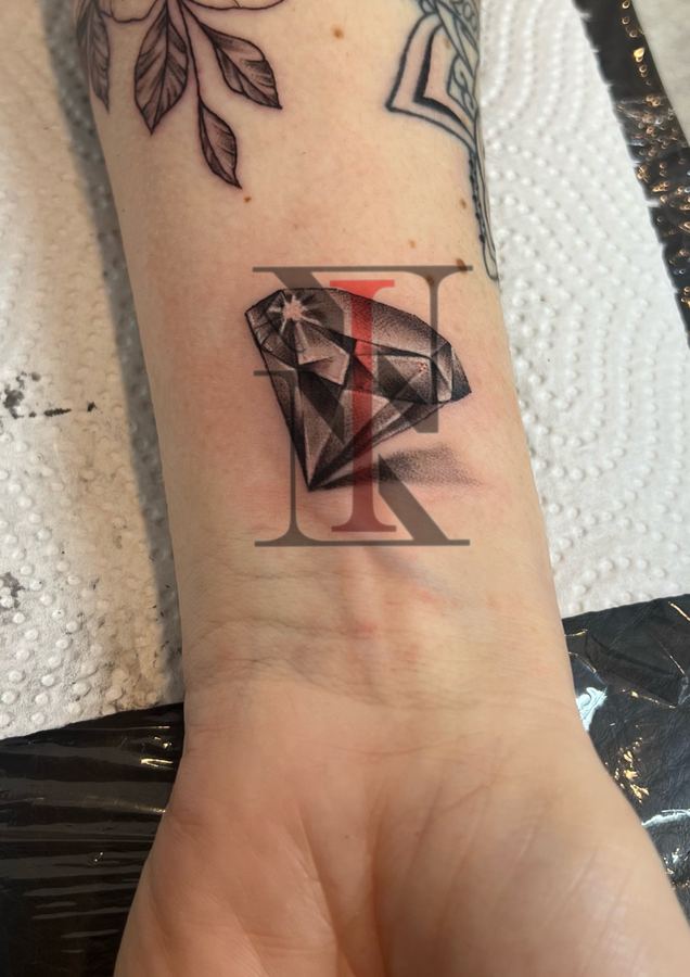 Realistic-Tattoo von Needle & Ink
